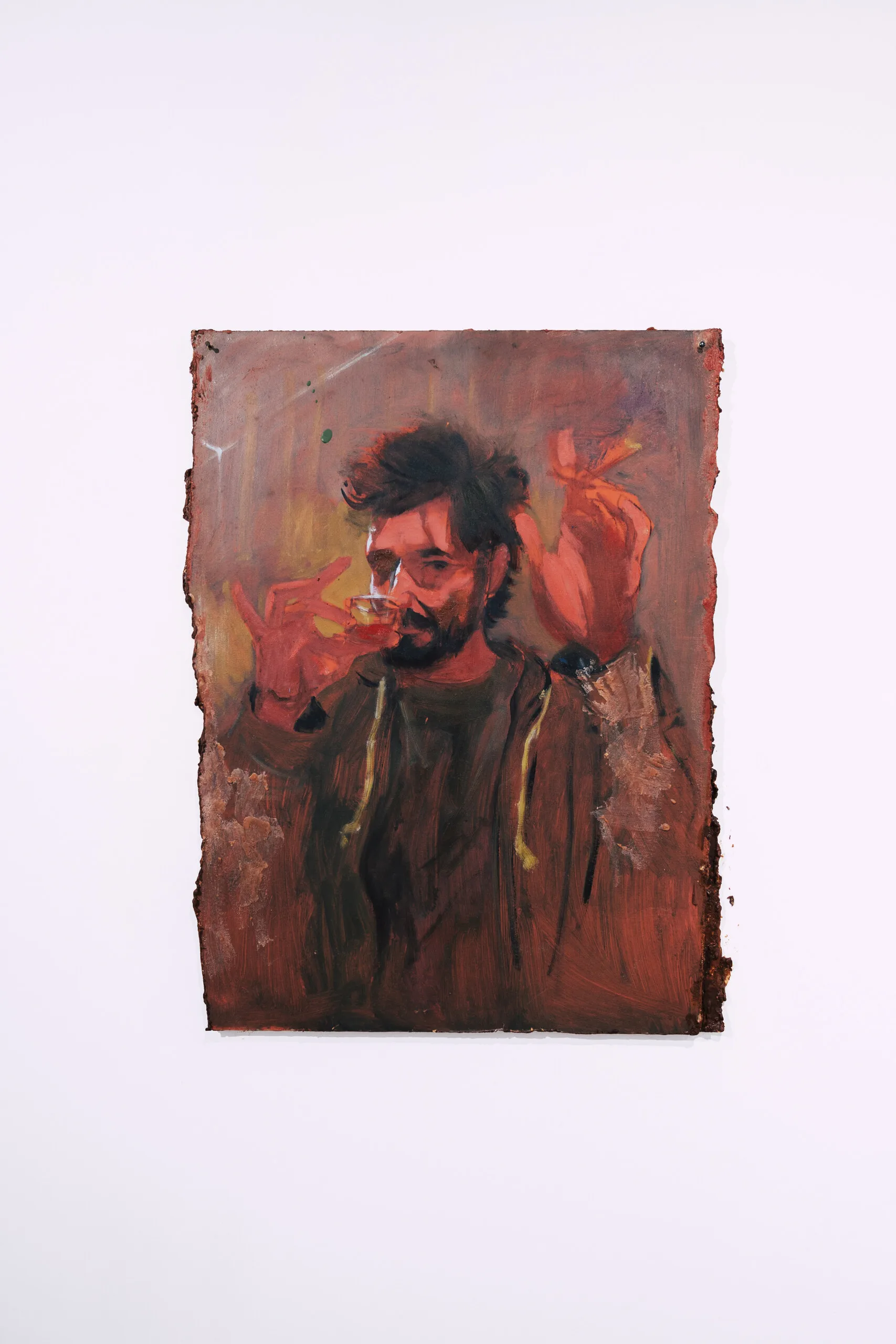 Espelho Meu: portrait of a bearded man in red on an irregular encaustic surface. Photo: Jenniffer Lima Pais